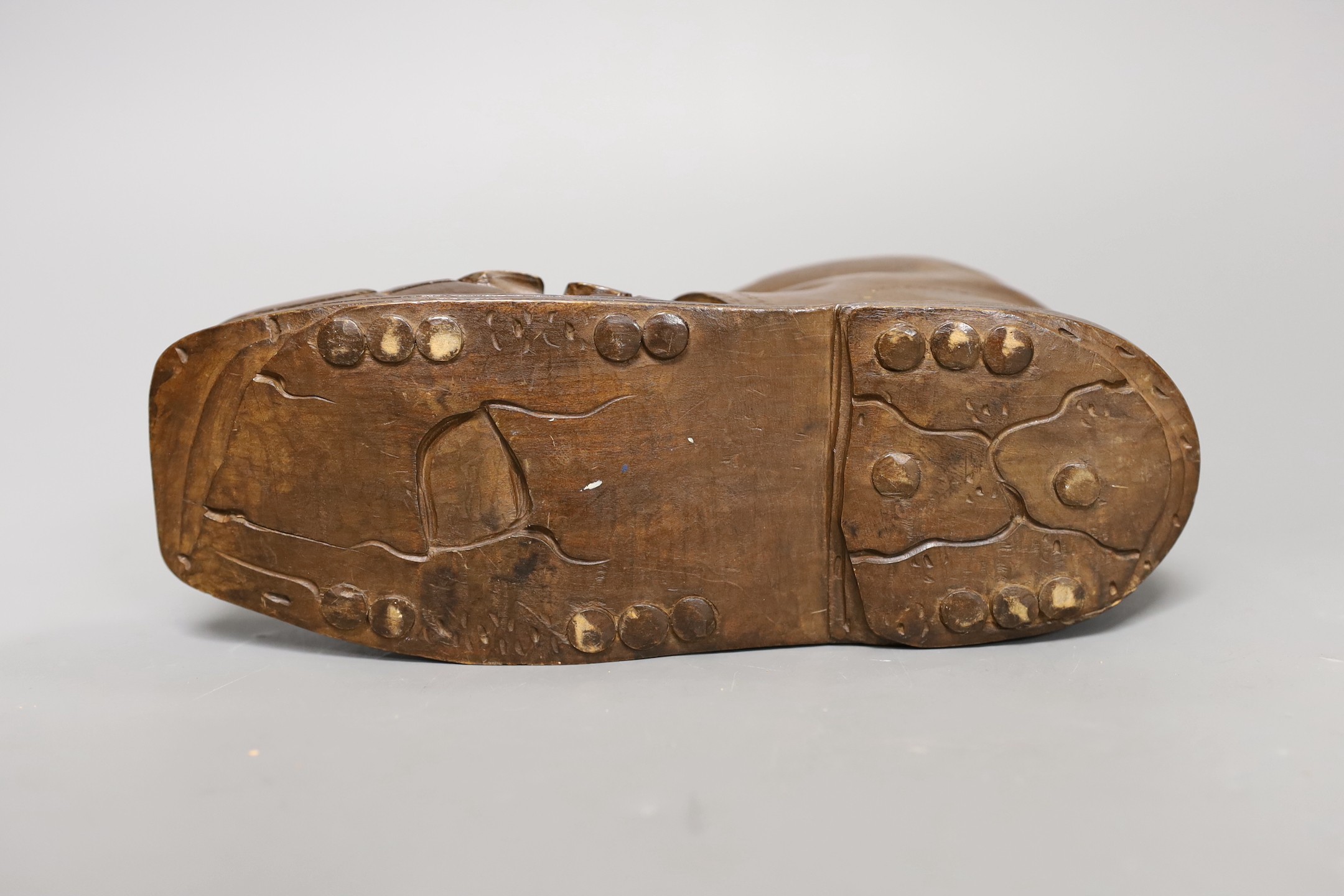 An early 20th century Swiss Caux treen 'boot' vesta case, 22cm long